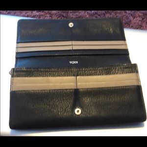 Tumi Black and Tan leather wallet